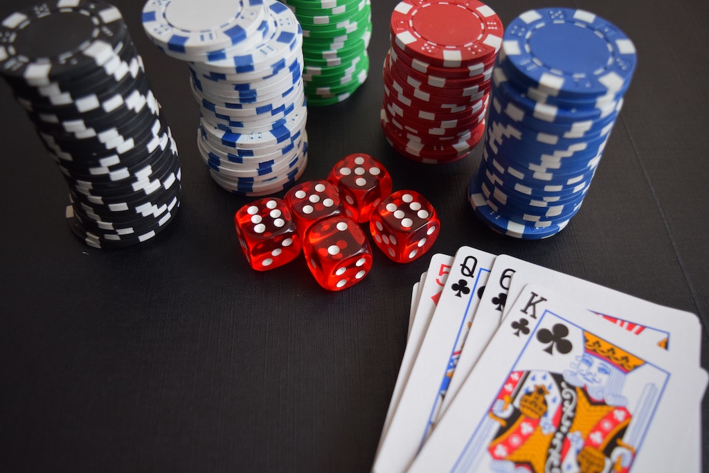 poker chips, dice and playing cards