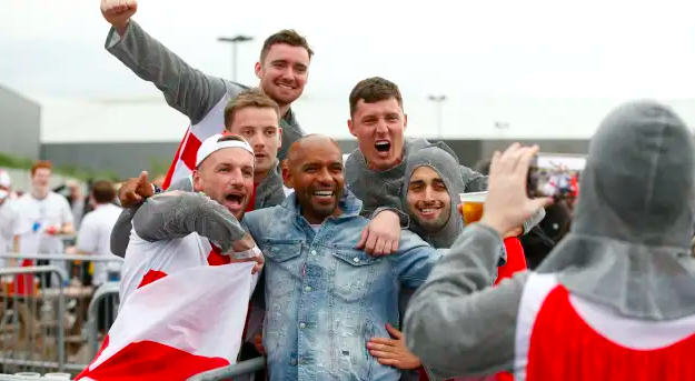 England fans photo op with English footballer Trevor Sinclair 
